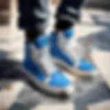 Elegant Blue Hi-Top Sneakers on Marble Surface