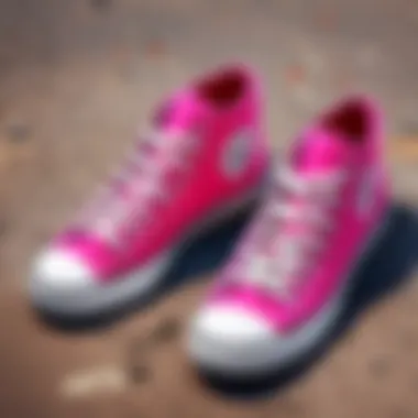 Pink canvas sneakers in a casual street-style setting